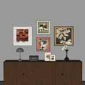 Abstract Paintings Wall Display With Wooden Cabinet Table Lamp Radio And Vase