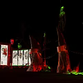 Cartoon Style Enchanting Forest Night View With Red Green Tree Trunks And Decorative Screen Structures