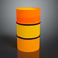 Orange Cylindrical Object With Yellow Stripe And Black Bands On Dark Background