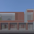 Modern Two Story Sales Office Building With Red Brick Exterior And Glass Windows Fronting Trees