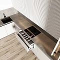 Modern Kitchen Interior With White Vertical Panel Cabinets And Black Countertop