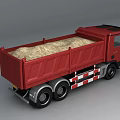 Red Dump Truck With Large Cargo Bed Loaded Full Of Hay