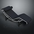Cat Resting On Modern Black Chaise Lounge With Silver Metal Frame
