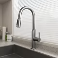 Contemporary Kitchen Sink Featuring Sleek Faucet And Window Blinds On Countertop