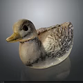 Light Pink Duck Sculpture with Textured Wings and Yellow Beak on Dark Background with Reflection