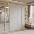 Modern White Wardrobe With Glass Doors Open Shelves And Dressing Table In Bedroom