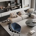 Modern Living Room Beige Sectional Sofa And Black Round Coffee Table Set With Decorative Pillows