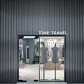 Clothing Store Interior With Clothes On Gold Racks Wooden Display Counter And Marble Floor