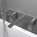 Wall Mounted Bathroom Faucet with Handheld Shower Above White Bathtub on Gray Wall
