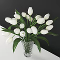 Silver Wine Bottle And Clear Glasses On Stylish Table With White Tulips Candles And Books