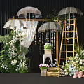 Elegant Floral Display with Arch Umbrella Decorations Green Plants and Fresh Flowers