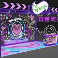 Vibrant Neon Themed Booth With YaYaYo Signage CrossFire Elements And Colorful Decorations