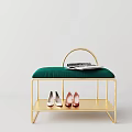Stylish Sofa Bench with Green Cushion and Gold Frame Topped with Magazine and Shoes Below