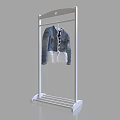 Stylish Denim Jacket With Lace Trim Hanging On White Clothes Rack