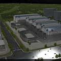 Multiple Industrial Warehouses With Green Landscaping Road Network And Sunset Sky