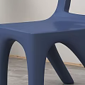 Blue Plastic Single Chair with Green Plant and Blinds in Modern Indoor Space