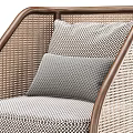 Comfortable Leisure Chair with Wooden Frame Woven Sides and Gray Cushions for Modern Living