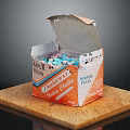 Open Paper Box Containing Colorful Chalks Placed On Wooden Board For Daily Use