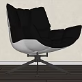 Modern Black Leather Accent Chair With White Seat And Swivel Metal Frame
