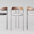 Modern Bar Stools With Metal Frames And Different Colored Cushions Set Of Three