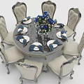 Classic Round Dining Table Set With Six Ornate Chairs And Blue Flower Bouquet
