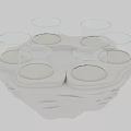 Mall Counter White Tray With Wavy Stacked Design And Transparent Glass Cups Golden Edges