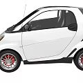 White Compact Car With Black Roof Red Alloy Wheels And Two Door Design