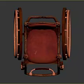 Classic Vintage Wooden Wheelchair With Red Seat And Ornate Carved Wheels