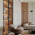 Contemporary Accent Chair In Stylish Living Space With Lit Bookshelf Floor Lamp And Beige Sofa