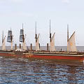 Vintage Sailing Ship with Multiple White Sails Red and Black Hull Navigating Open Sea Against Sky