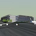 Large Industrial Building With Roof Logo Parking Lot Green Trees And Adjacent Structure