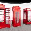 Three Iconic Red Telephone Booths Classic Public Facility with Glass Panels