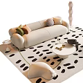 Modern Beige Sofa And Coffee Table With Green Armchair Black White Spotted Rug And Pillows
