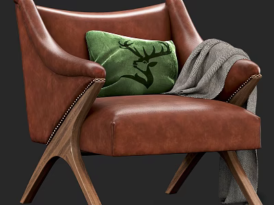Brown Leather Armchair With Green Deer Pattern Pillow Gray Blanket Wooden Legs And Rivet Accents 3d model