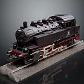 Black Steam Train Model With Red Wheels On Grey Base