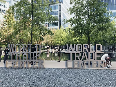 World Trade Center Sculpture in Urban Park with Trees and Visitors Nearby 3d model