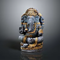 Elegant Seated Ganesha Statue With Intricate Golden Accents And Detailed Ornaments