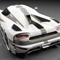 Modern White Koenigsegg Supercar Featuring Gold Stripes Carbon Fiber And Aerodynamic Design