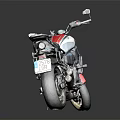 Red and White Vintage Motorcycle With Black Seat And Sleek Alloy Wheels Design