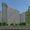 Modern Office Building With Glass Curtain Walls And Surrounding Green Trees