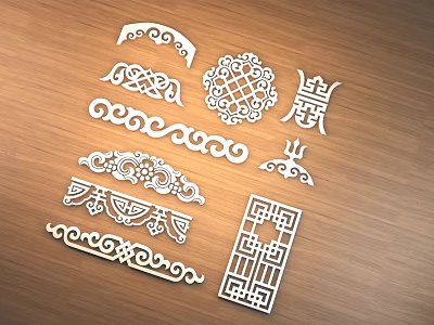 Ornate Wooden Decorative Carvings With Various Traditional Patterns And Shapes On Table 3d model