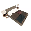 Double Bed with Upholstered Headboard Bedside Tables White Table Lamps and Brown Green Bedding
