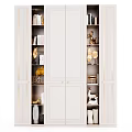 Elegant White Bookcase With Multiple Shelves Holding Books Golden Sculptures And Vases