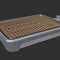 Portable Outdoor BBQ Grill With Metal Grates And Silver Frame Design