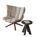 Beige Upholstered Accent Chair with Tufted Back Wooden Cross Legs and Black Round Side Table