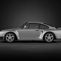 Silver Porsche Classic Sports Car With Sleek Body Design And Brown Leather Interior