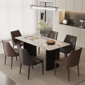 Marble Top Dining Table With Brown Black Chairs And Vase Plant In Modern Dining Area
