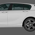 White BMW Hatchback Car With Sleek Exterior And Black Alloy Wheels