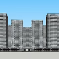 Modern Twin High Rise Residential Buildings With Entrance Landscaping And Evening Sky