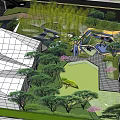 Modern Garden Landscape Design With Geometric Building Green Trees Stone Paths And Water Features
